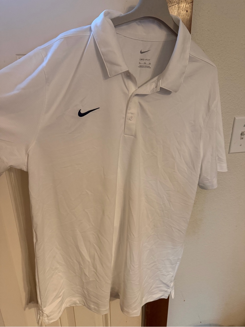 Nike Men’s White Polo with Black Swoosh